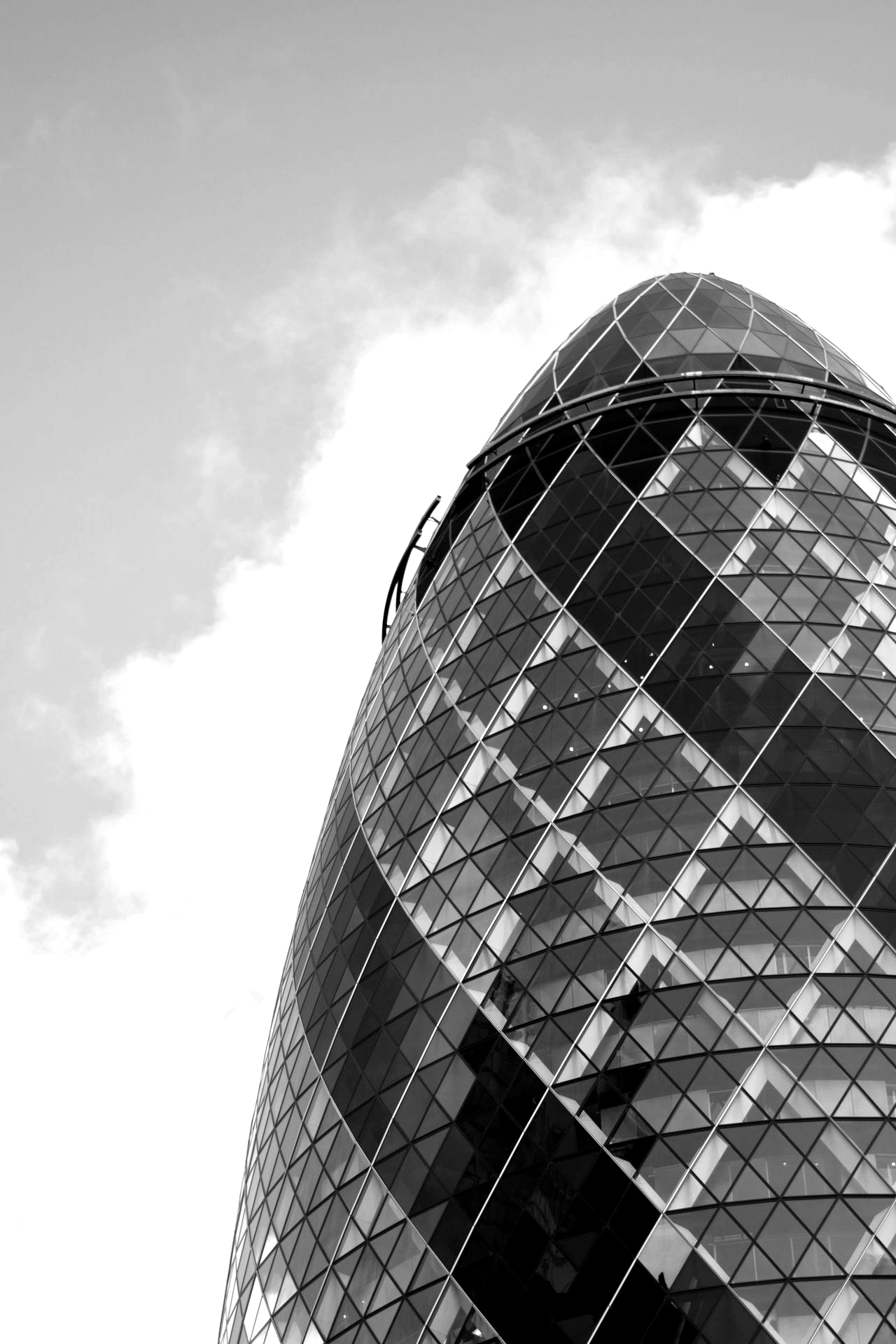 blue glass walled high rise building